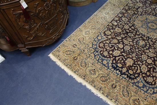 An Isfahan carpet, 8ft 4in by 4ft 8in.